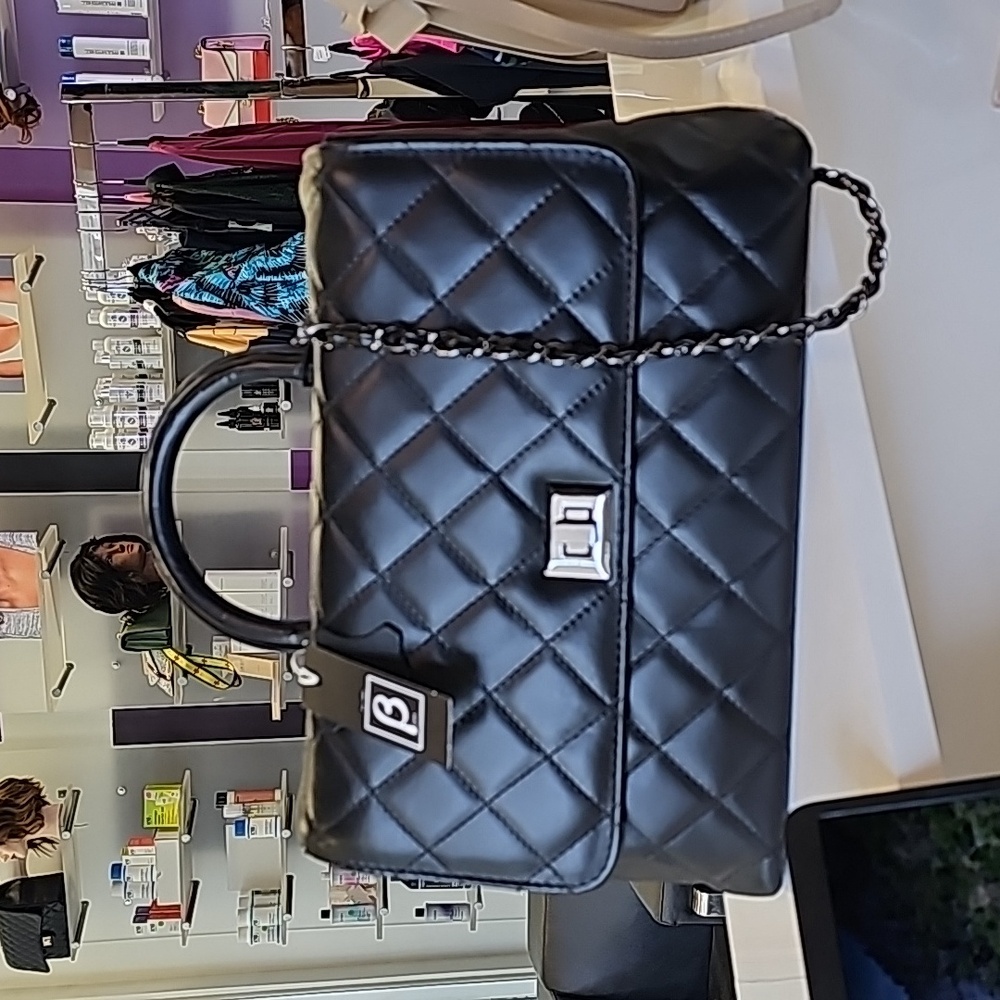 Black real leather quilted bag